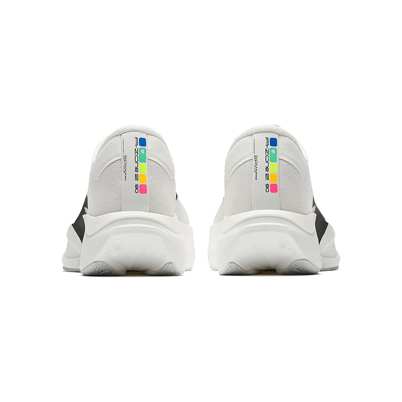 Pair of ANTA C202 LSD Zone 2 N90 White Black running shoes, rear view showing the heels and multicolour branding.