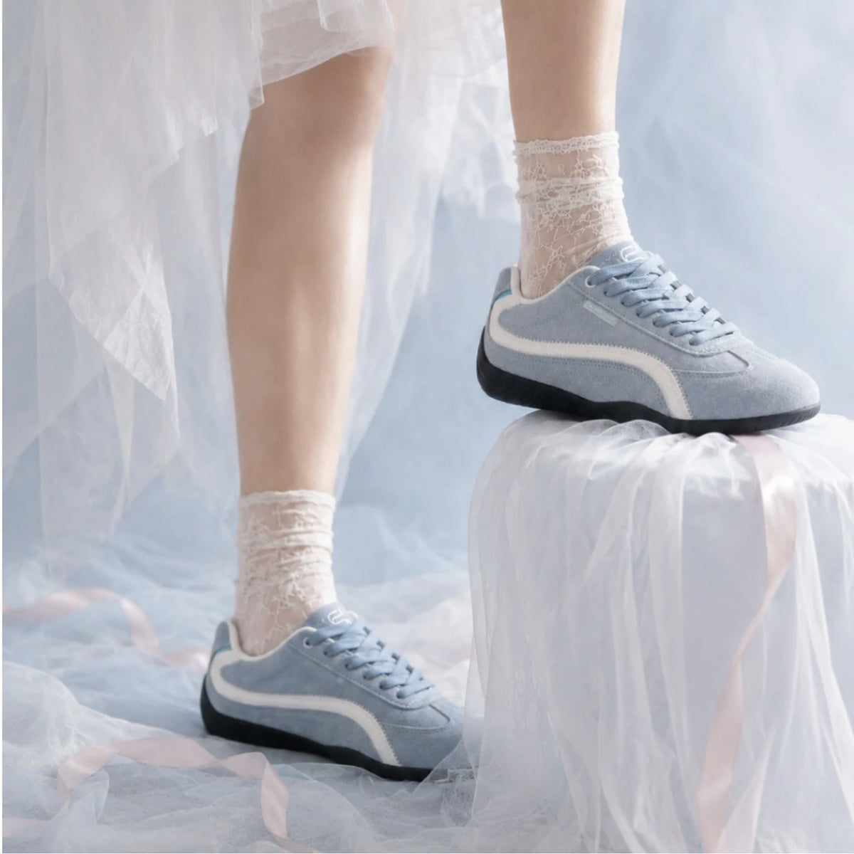 SneakSurf Racer in Sky Blue/Light Blue worn on foot, full styling view