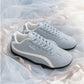 SneakSurf Racer in Sky Blue/Light Blue styled pair on fabric