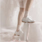 SneakSurf Racer in Silver Metallic/White worn on foot, full styling view
